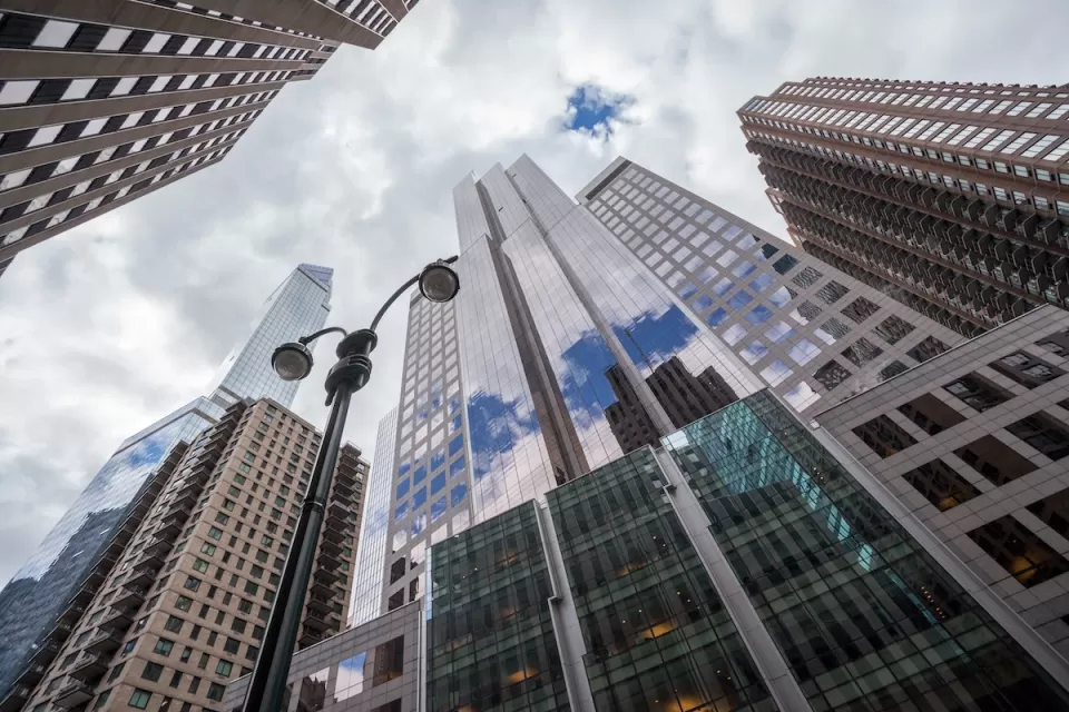 View up at high-rise buildings in Midtown Manhattan, New York City.